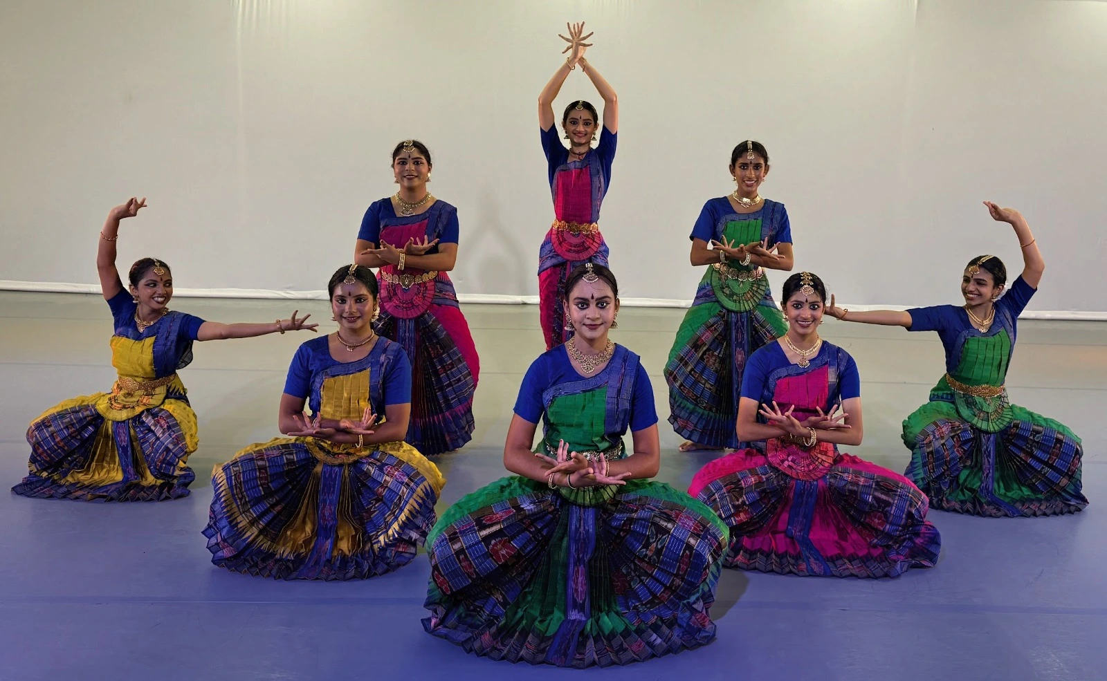 Abinaya dancers in a group formation for Anādi